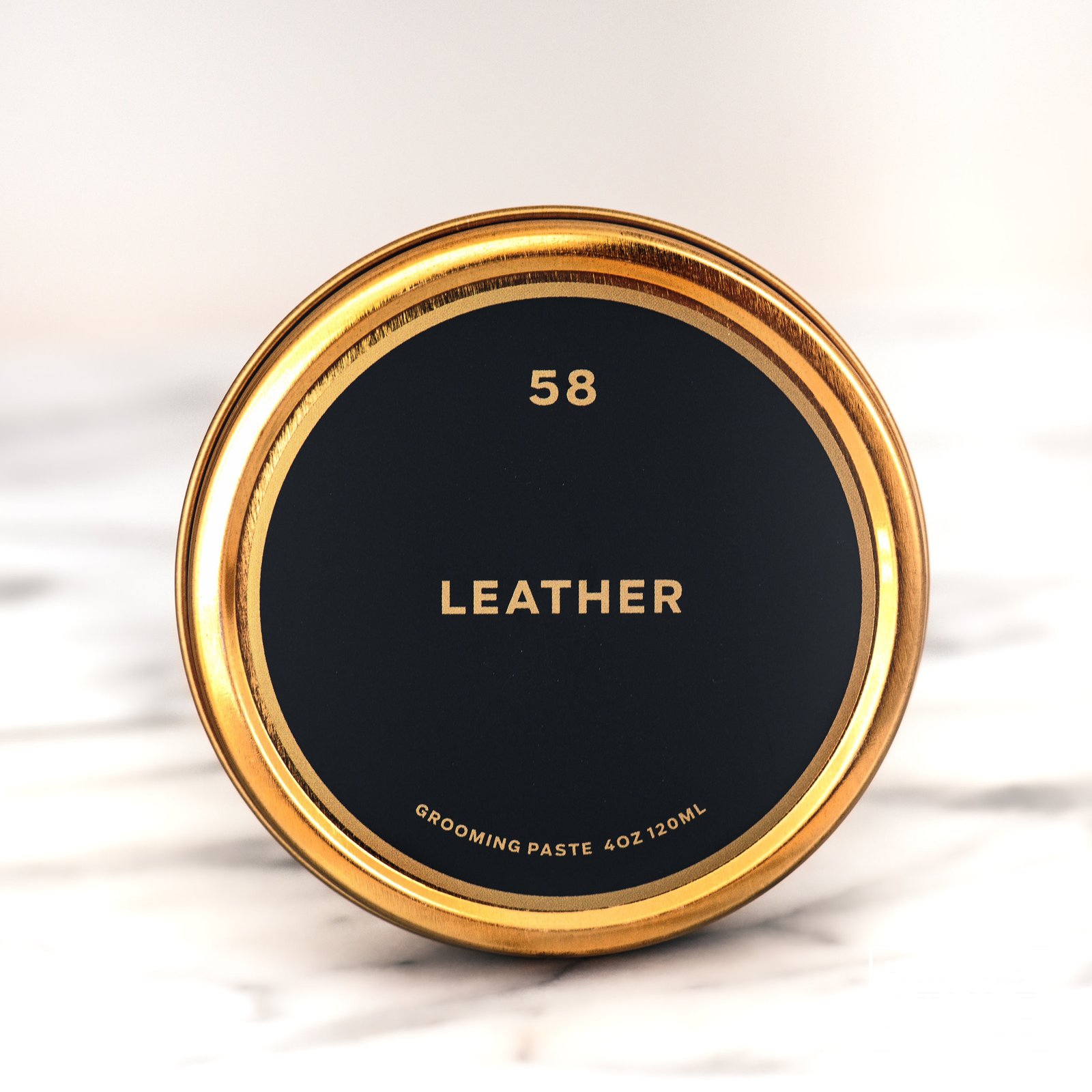 This grooming pomade adds control, style and hydration to hair. Apply a small amount in your hands and rub together. Run fingers through hair for desired look. Reapply if necessary. Style with a comb, brush or fingers. A blend of Beeswax, Organic Aloe Vera Butter, French Green Clay infused with Resins and Organic Essential Oils.