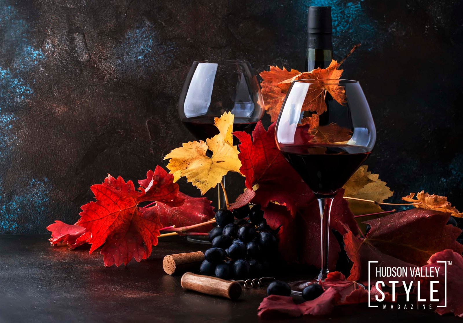 Dry Red Wine in big wine glass, autumn still life with leaves, wine tasting concept, rustic style, selective focus